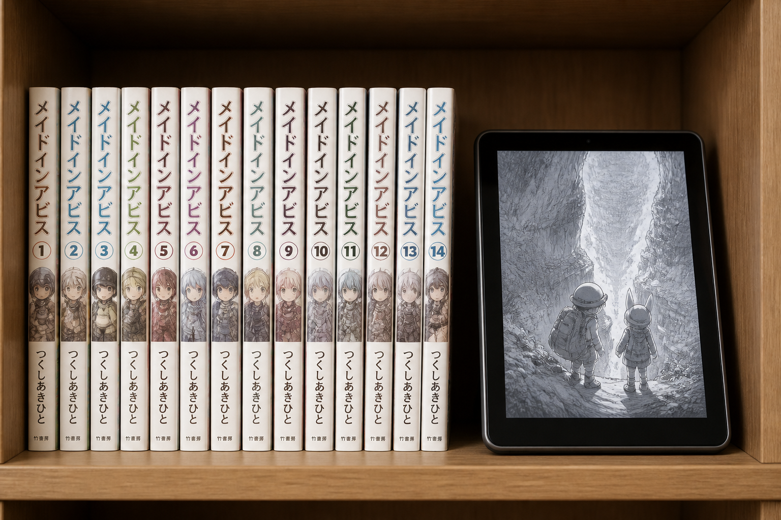 木枠の書棚に並ぶ単行本コミックスと電子書籍端末を並べた静物