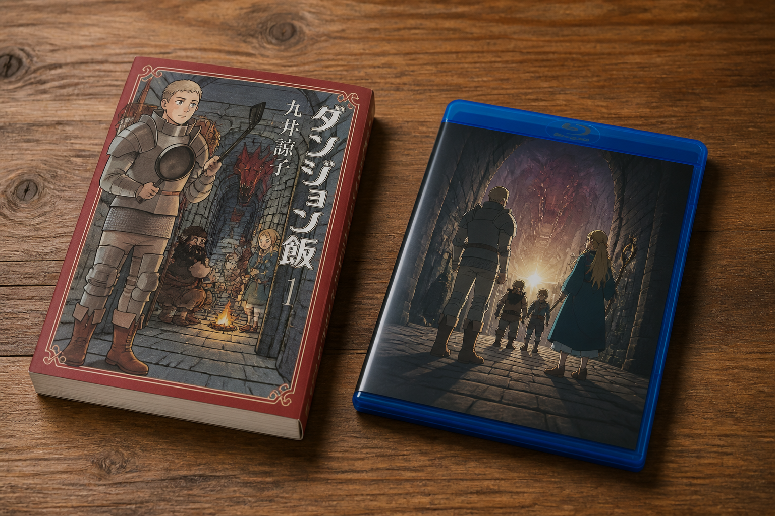 ダンジョン飯の原作単行本とアニメBDパッケージが机の上に並べられた静物